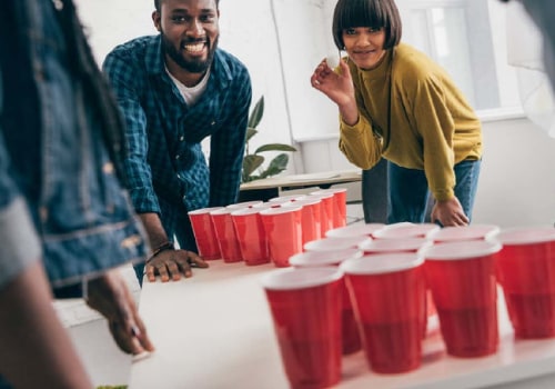 Are there any special rules for playing beer pong with different numbers of cups on each side of the table?