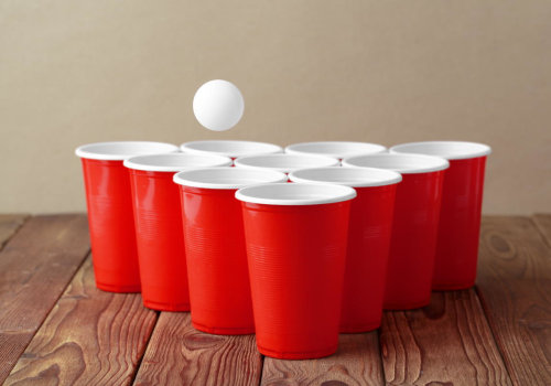 Are there any special rules for playing beer pong with different numbers of balls on each side of the table?